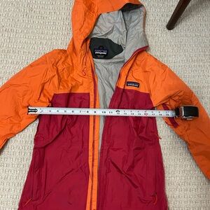 Patagonia Women’s Orange and Red light rain jacket